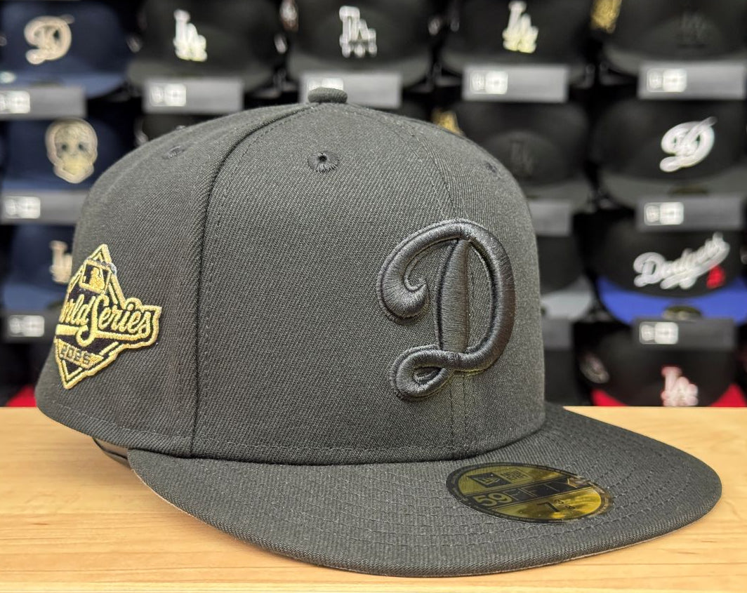Los Angeles Dodgers New Era 2025 World Series D Logo Side Patch 59FIFTY Fitted Hat - Black on Black Gold - THE 4TH QUARTER